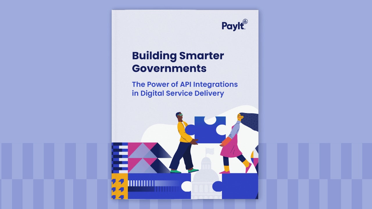 Cover image of a white paper titled “Building Smarter Governments: The Power of API Integrations in Digital Service Delivery,” published by PayIt. The design features two illustrated people connecting large puzzle pieces in front of a government building, symbolizing collaboration and integration. The background is primarily white with colorful geometric patterns at the bottom.