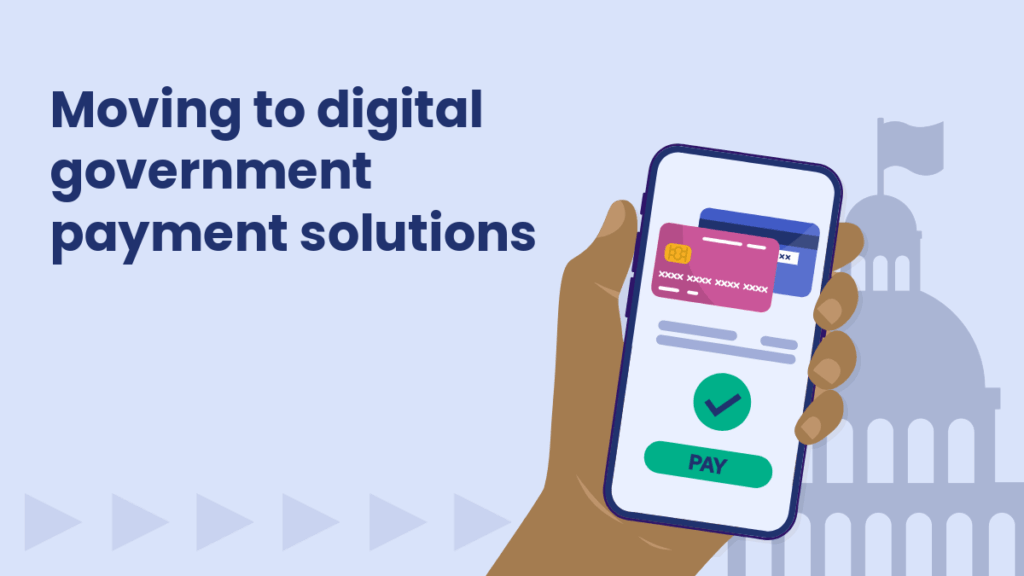 Illustration of a hand holding a smartphone with digital payment cards and a green “PAY” button on screen. Text on the left reads “Moving to digital government payment solutions,” with a government building silhouette in the background.